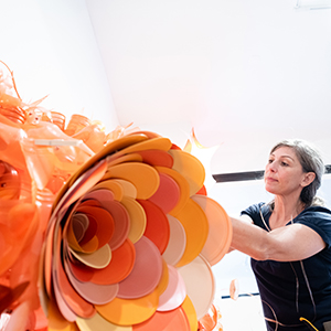 Aurora Robson installs sculpture at Brattleboro museum.
