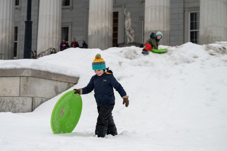 Advocates gather at the State House in support of public education and sled.