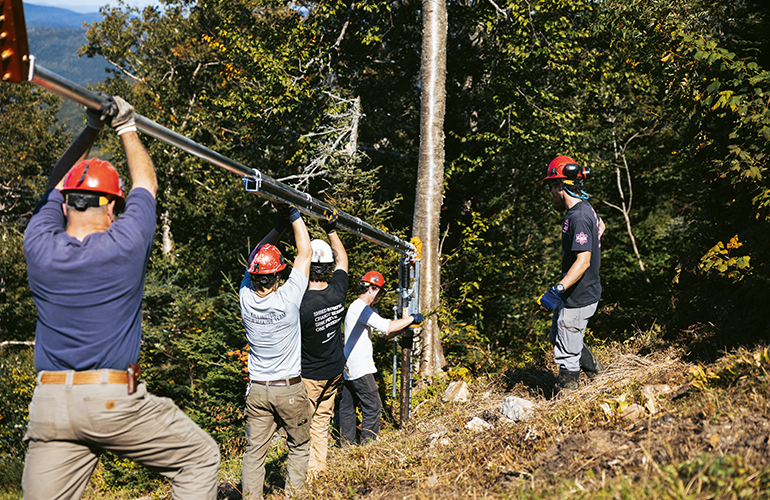 Photo: Killington Resort installing new energy efficient snow guns. Photos: Killington Resort