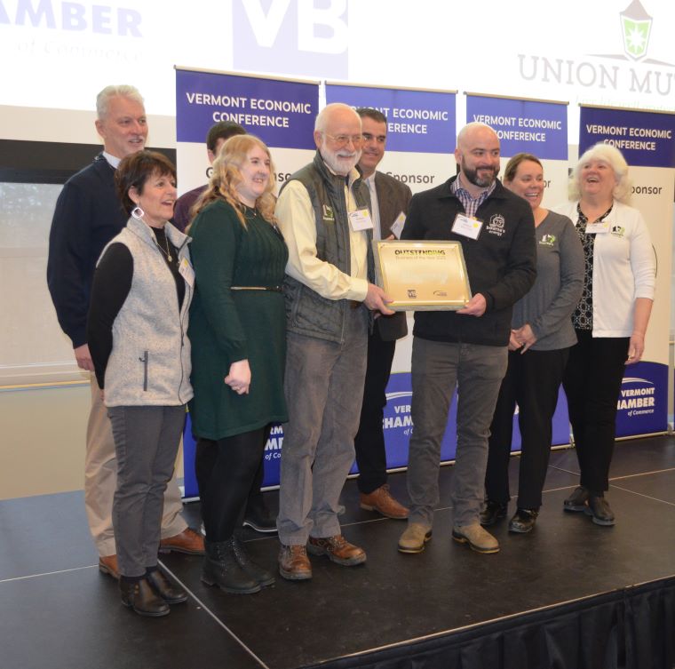 Bourne's Energy  accepts Outstanding Business of the Year Award.