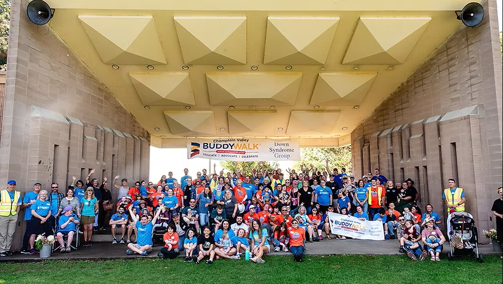 2024 Champlain Valley Buddy Walk group photo at Battery Park in Burlington.