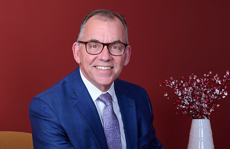 Photo: Chris Caldwell, CEO of Communtiy National Bank celebrating the bank's 175-year  anniversary and their approval for lising on Nasdaq. Photo: StoryWorkz/Paul Richardson