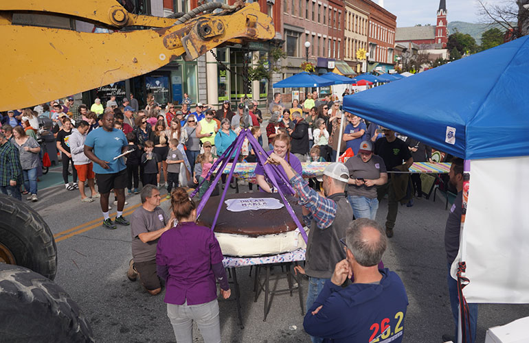 Photo: Left: Employees of Dream Maker Bakers in Killington unveil their 770-pound entry at the Rutland Whoopie Pie Fest. Courtesy photo.