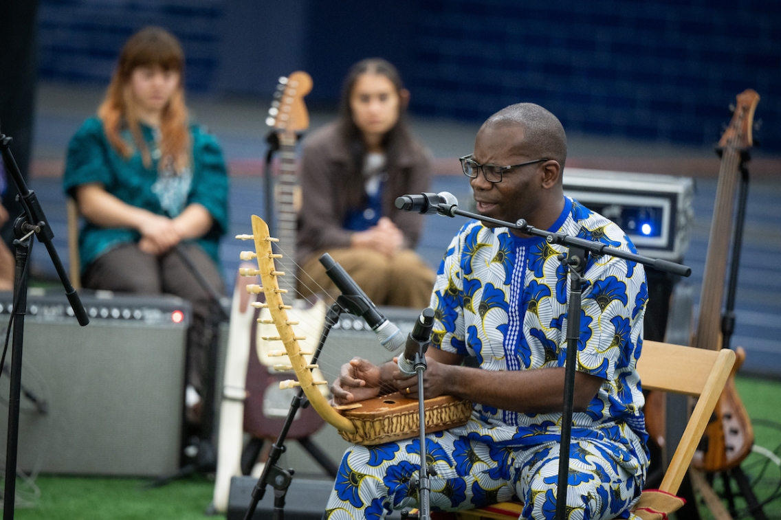 Professor Damascus Kafumbe performs an original piece on the&nbsp;adungu. (Credit: Andy Duback )