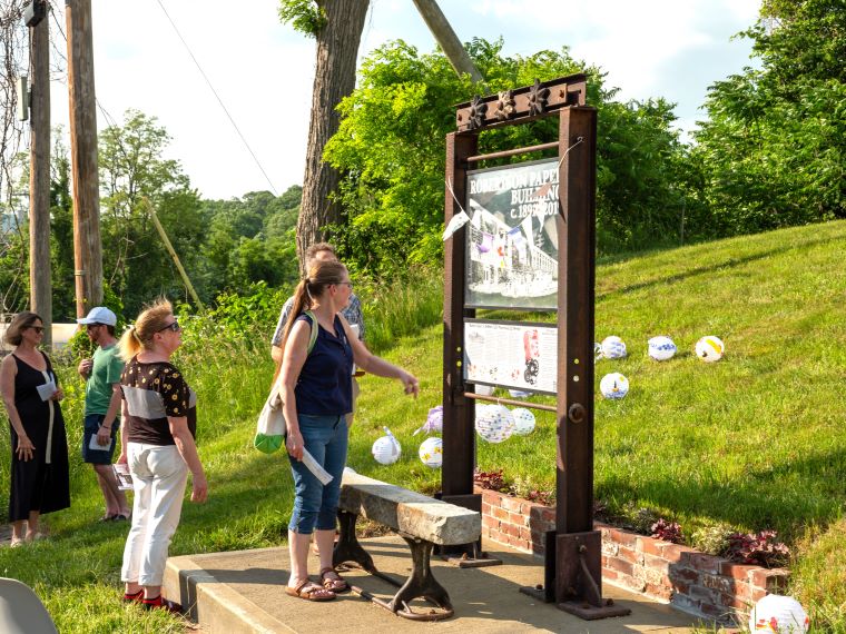 Former mill employees inspect the historic kiosk All photos by Daimian Lix.