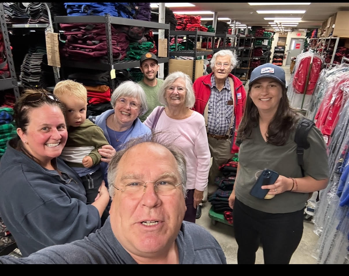 Gene Richards with staff. Courtesy Johnson Woolen Mills