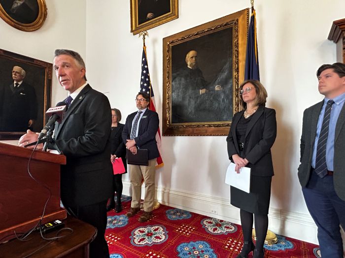 Governor Scott discusses his objections to continue the Hotel/Motel program at his press conference Wednesday afternoon. From right are Housing Commissioner Alex Farrell, Commerce Secretary Lindsay Kurrle, DCF Commissioner Chris Winters and Human Services Secretary Jenney Samuelson.