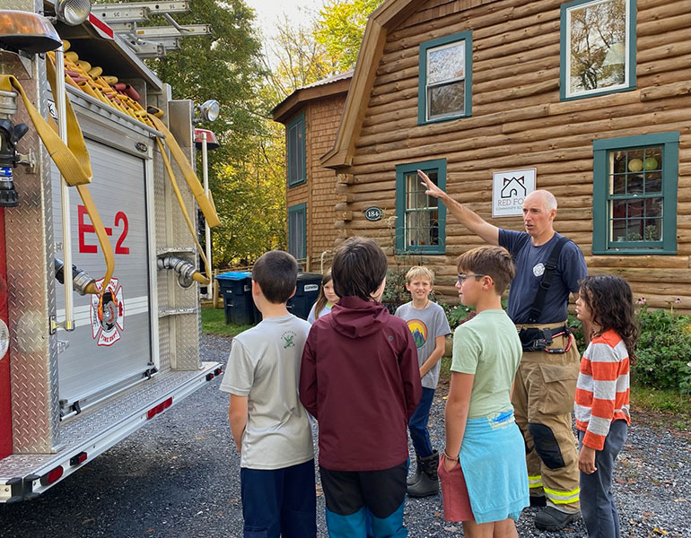 Photo: Local firefighters and Red Fox parents, Nick Parks and Leslie Bledsoe, to teach students essential fire safety skills. Courtesy photos.