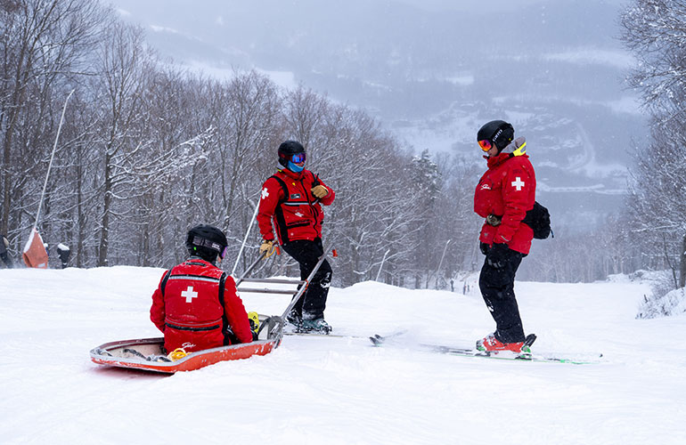 Photo: Mount Mansfield Ski Patrol members have cared for injured visitors since 1934. Courtesy photos.