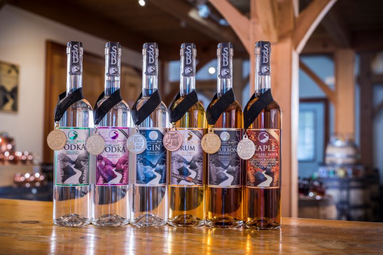 Smugglers’ Notch Distillery will mark the official grand opening of its newest Tasting Room and Retail Shop at the Taft Corners Shopping Center in Williston, Vt. on Tuesday, July 2.