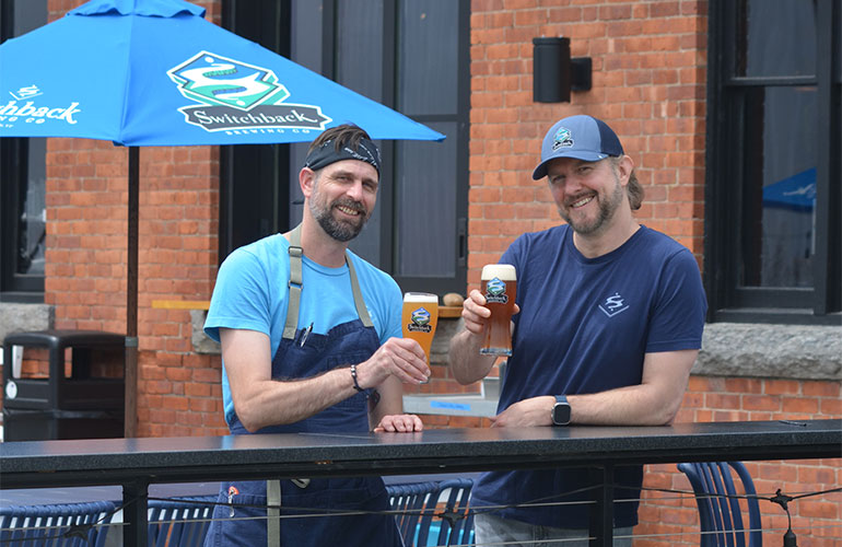 Photo: Chris Cantrell, chef, and Josh Weber, managing partner, at Switchback Smokehouse. Photo by Katie Kittell.