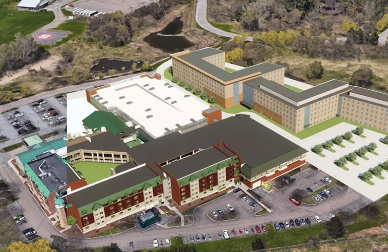 Photo: Catamount Woods near the main UVM campus was canceled less than a year after the university and the city of Burlington reached an agreement on its development. The $100 million projects would have accommodated approximately 540 undergraduate students in apartments, when completed in 2025. Rendering courtesy University of Vermont.