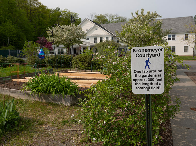 Photo: Kronemeyer Courtyard at Valley Cares senior housing in Townshend commemorates Warren Kronemeyer, who owned and operated a business with his partner of 58 years, Leon Ingall, before donating the property that would become Valley Cares. Photo: Maia Segura