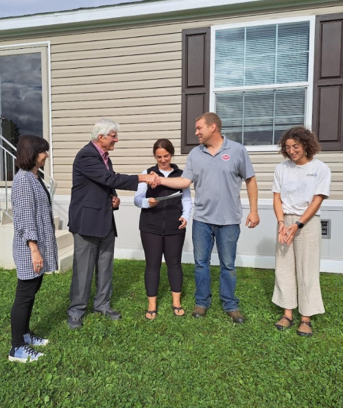 The Vermont Disaster Recovery Fund delivered a $21,000 check on Labor Day to the James and Addie Wheeler family for the loss of their Berlin home in the July 2023 floods. 