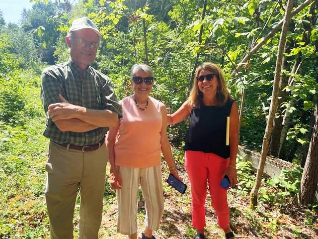 Landowners Russ and Ellen Green, and Town Manager Mary Ann Goulette
