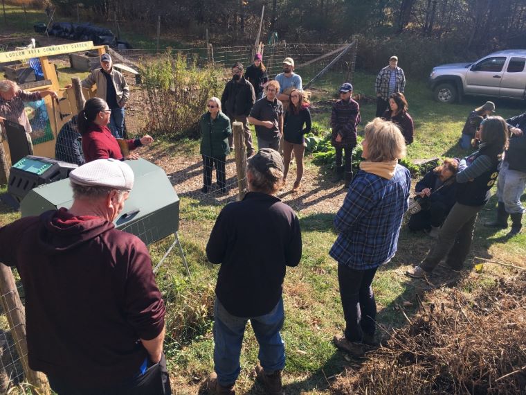 Master composter students discuss different community-scale compost systems at the Ludlow Area Community Garden in Ludlow