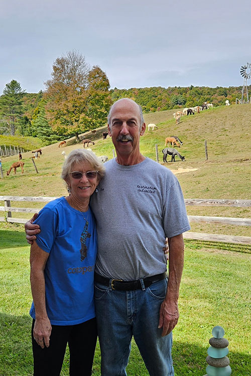Photo: Mary and Jim Cobb, co-owners of Coventry Falls Alpaca Farm and Peaceful Path. Courtesy photo.