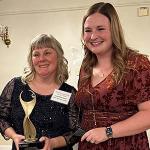 Caroline Earle, with trophy, and Sarah Gallant.