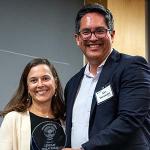Linday DesLauriers with Champlain College President Alex Hernandez.